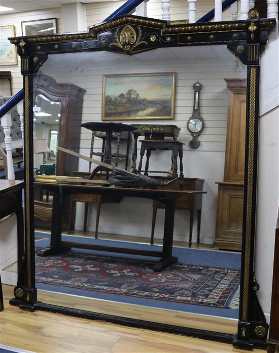 A Victorian aesthetic period ebonised overmantel, 5ft 4in. H.5ft 8in.